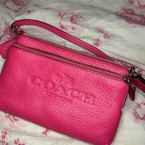 Pink coach wristlet wallet